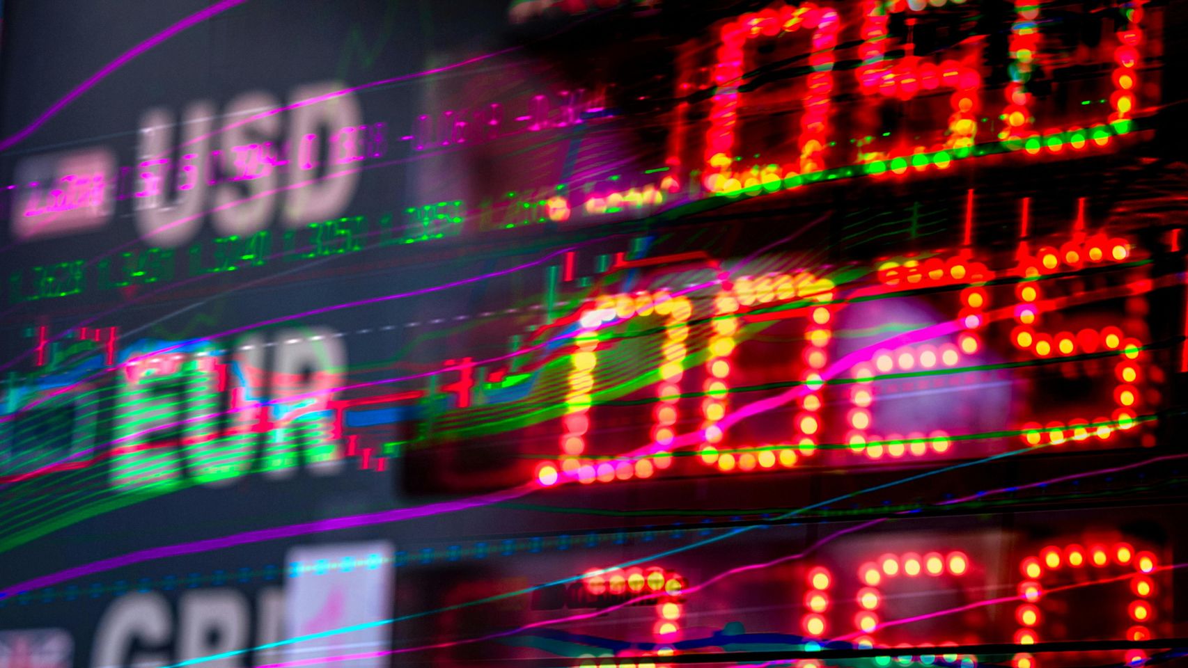 Pantalla con cotizaciones del dólar, el euro y la libra.