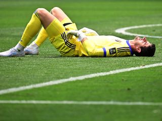 Thibaut Courtois, lesionado durante el partido contra España.